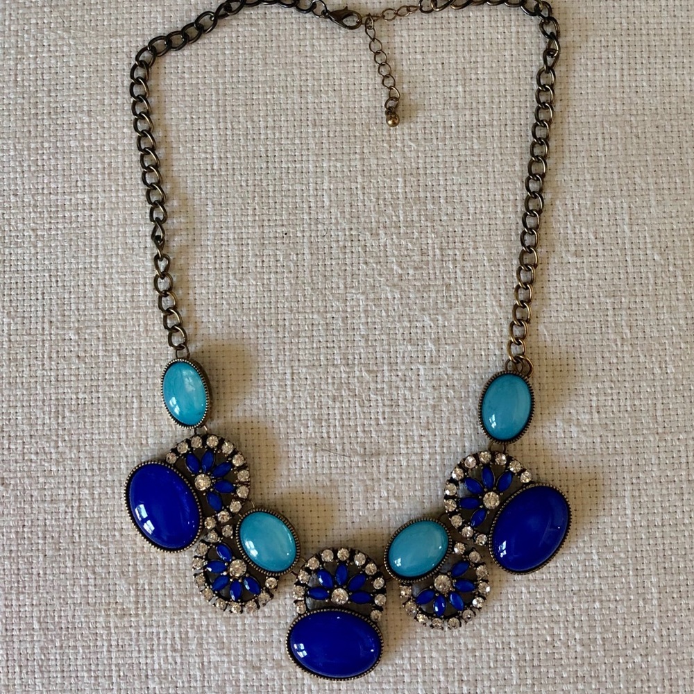 Blue and cubic zirconia metal statement necklace